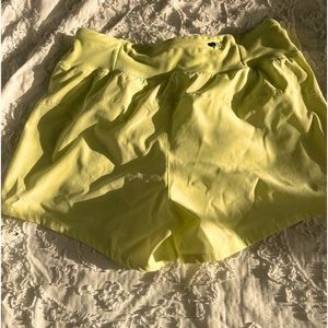 Reebok shorts, neon, yellow, pockets, extra small.